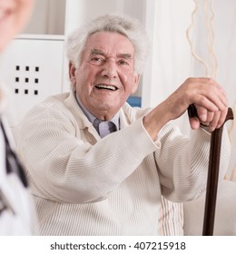 Image Of Smiling Rich Old Man And His Private Medic