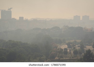 Image Of Smoke From A Fire Over A City In Rome, Italy