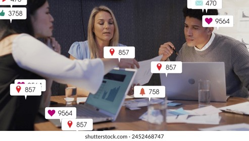 Image of social media data processing over diverse business people in office. Global business, finances, computing and data processing concept digitally generated image. - Powered by Shutterstock - Get 15% off with code: PIKWIZARD15