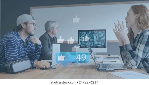 Image of social media data processing over diverse business people in office. Global computing, digital interface and data processing concept digitally generated image. - Powered by Shutterstock