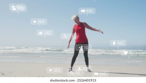 Image of social media data processing over caucasian women exercising on beach. Global fitness, networks, computing, digital interface and data processing concept digitally generated image. - Powered by Shutterstock