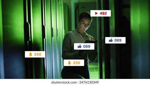 Image of social media icons and numbers over caucasian female it technician by computer server. Global business, finances, computing and data processing concept digitally generated image. - Powered by Shutterstock