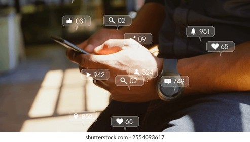 Image of social media icons with numbers over caucasian man using smartphone. Global communication, social media, connections and digital interface concept digitally generated image. - Powered by Shutterstock