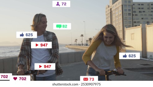 Image of social media icons on banners over happy caucasian couple on scooters by seaside. social media, digital interface and connections concept digitally generated image. - Powered by Shutterstock