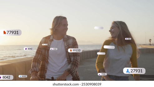 Image of social media icons on banners over smiling caucasian couple riding scooters by seaside. social media, digital interface and connections concept digitally generated image. - Powered by Shutterstock