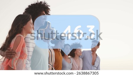 Image of speech bubble with increasing likes over diverse friends posing for a picture at beach. Social media networking technology concept