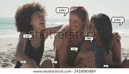 Image of speech bubbles with lol text over female friends smiling on beach. digital interface, social media and global network concept digitally generated image.