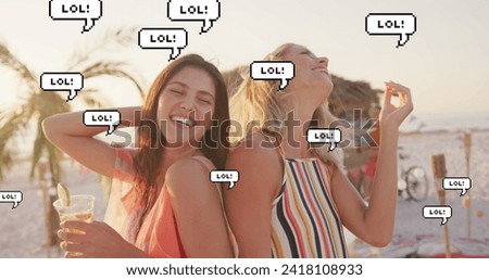 Image of speech bubbles with lol text over female friends dancing on beach. digital interface, social media and global technology concept digitally generated image.