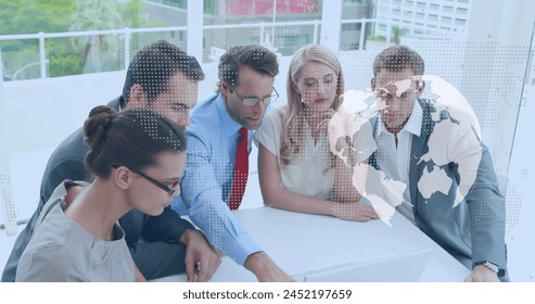 Image of spinning globe and world map over diverse businesspeople discussing together at office. Global finance and business technology concept - Powered by Shutterstock