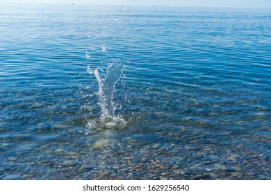 Image of a splash at sea.