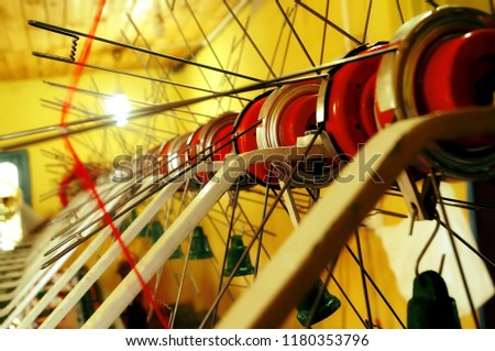 Image of spool of threads inside a silk weaving store in the silk weaving town of Sualkuchi, Guwahati in Assam, India