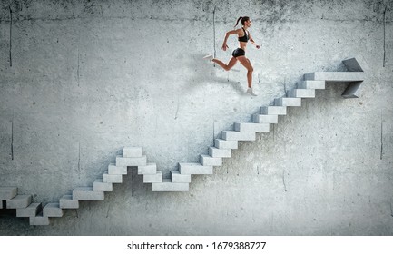 Image of sport woman walking upstairs