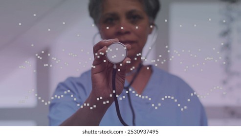 Image of spots over african american female doctor with stethoscope. senior home hangout and digital interface concept digitally generated image. - Powered by Shutterstock