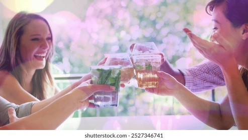 Image of spots over happy diverse friends with drinks. world cocktail day and celebration concept digitally generated image. - Powered by Shutterstock