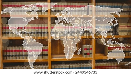 Image of spots and world map over books in library. global business and digital interface concept digitally generated image.