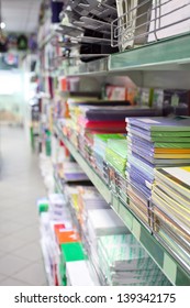 The Image Of Stationery Lie On The Shelf