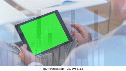 Image of statistical data processing over caucasian man using digital tablet with copy space. Global networking and business data technology concept