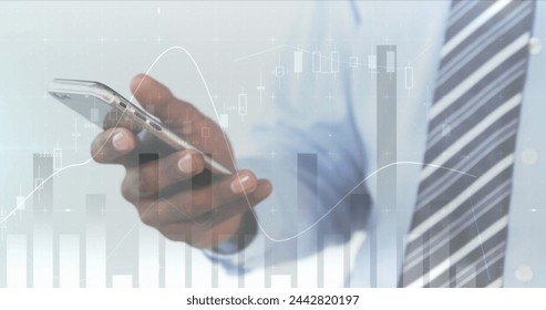 Image of statistics and data processing over man using smartphone. global business, digital interface and technology concept digitally generated image. - Powered by Shutterstock