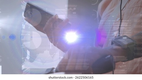 Image of statistics and data processing over caucasian businessman using smartphone. global data processing, connections, and business concept digitally generated image.