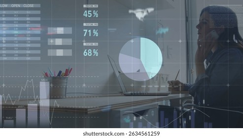 Image of statistics and data processing over businessman using laptop. Global business digital interface technology and networking concept digitally generated image.