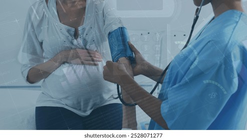 Image of statistics and financial data processing over female doctor and pregnant woman. Global medicine, healthcare services and data processing concept digitally generated image. - Powered by Shutterstock