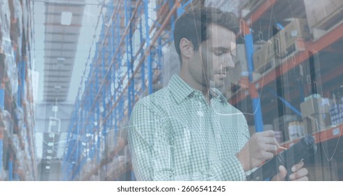 Image of statistics and financial data processing over man working in warehouse. global shipping and connections concept digitally generated image.
