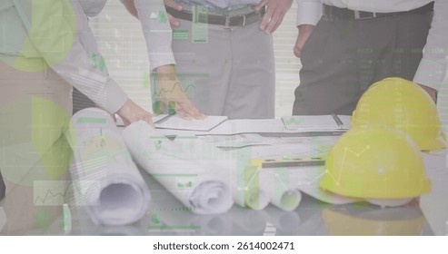 Image of statistics and financial data processing over architects with plans in meeting. global architecture, business and data processing concept digitally generated image.
