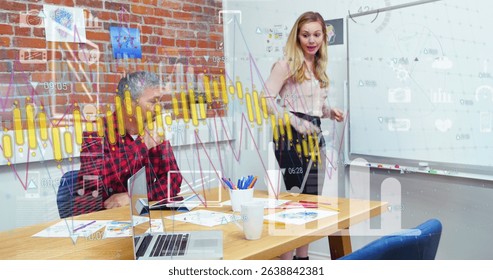 Image of statistics and financial data processing over diverse business people in office. Global business, data processing and digital interface concept digitally generated image.