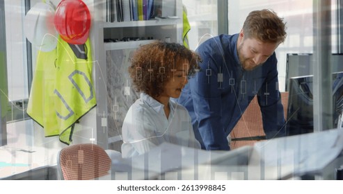 Image of statistics processing over male and female architects discussing. business, development and productivity concept digitally generated image.