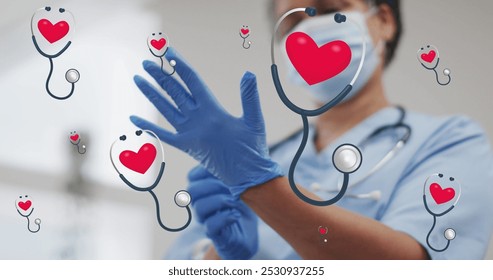 Image of stethoscope icons over african american female doctor with gloves. senior home hangout and digital interface concept digitally generated image. - Powered by Shutterstock