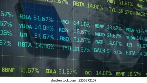 Image of stock market data processing against close up of a smartphone. Global economy and business technology concept