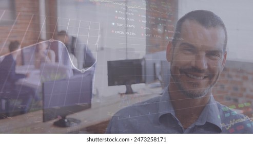 Image of stock market data processing over caucasian man smiling at office. Global economy and business data technology concept