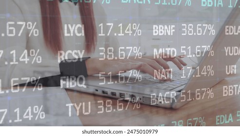Image of stock market data processing against mid section of a woman using laptop. Global economy and business technology concept