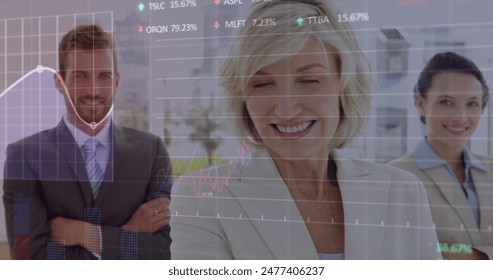 Image of stock market data processing over portrait of diverse businesspeople smiling at office. Global economy and business data technology concept
