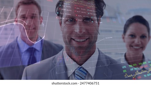 Image of stock market data processing over portrait of diverse businesspeople smiling at office. Global economy and business data technology concept