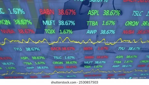 Image of stock market data processing against computers on office desks. Global economy and business technology concept