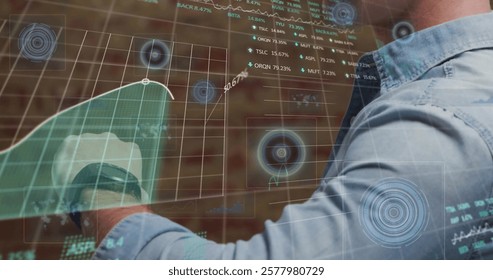 Image of stock market and data processing over caucasian man checking smartwatch. Global technology and digital interface concept digitally generated image. - Powered by Shutterstock - Get 15% off with code: PIKWIZARD15