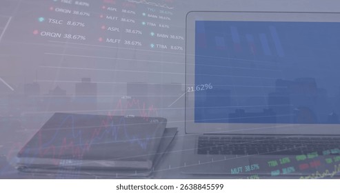 Image of stock market data processing over laptop and diary against cityscape. Global economy and business technology concept