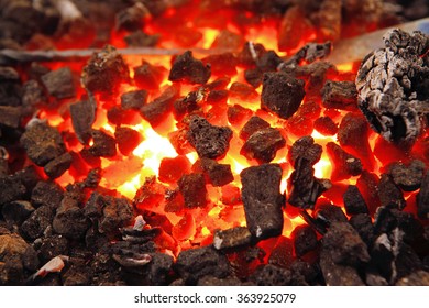 image of stone charcoal fire on bugle as abstract background