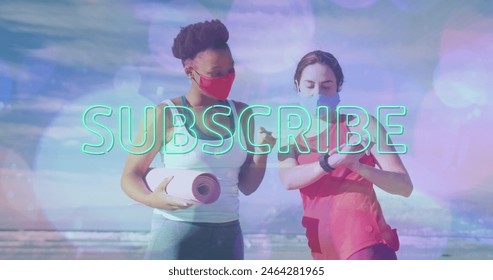 Image of subscribe neon text over diverse women in face mask exercising. global social media, digital interface and sports concept digitally generated image. - Powered by Shutterstock