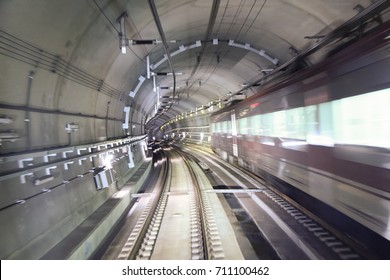 Image Of A Subway Passing Through A Tunnel - Taken At A Low Speed To Give A Speed Effect