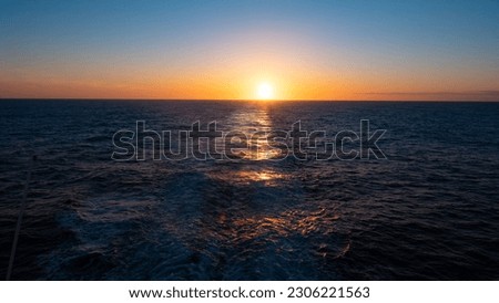image of sunset at sea. sunset at sea nature. sunset at sea seascape. beautiful sunset at sea water