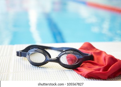 Image of swimming pool, goggles and swimming hat. Nobody - Powered by Shutterstock