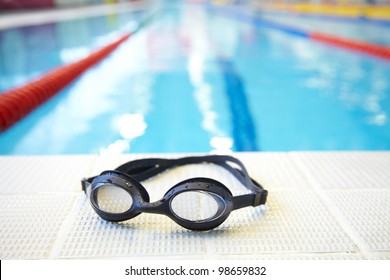 Image Of Swimming Pool And Goggles. Nobody