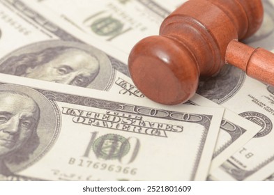 The image symbolizes the intersection of justice and finance, suggesting the role of money in legal proceedings or the financial implications of legal decisions.