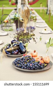 Image Of Table Setting For A Rustic Wedding Or Dinner Party In The Garden.