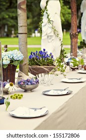 Image Of Table Setting For A Rustic Wedding Or Dinner Party In The Garden.