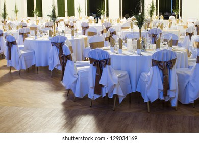 An Image Of Tables Setting At A Luxury Wedding Hall