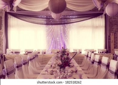 an image of tables setting at a luxury wedding hall - colorized photo
