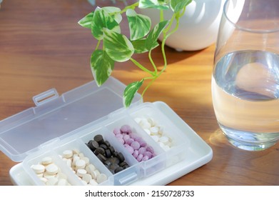 Image Of Taking A Supplement